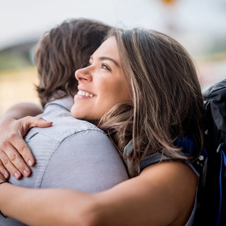 Woman hugging her loves ones